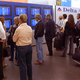 Passengers at San Diego International Airport await news of more midair cancellations.